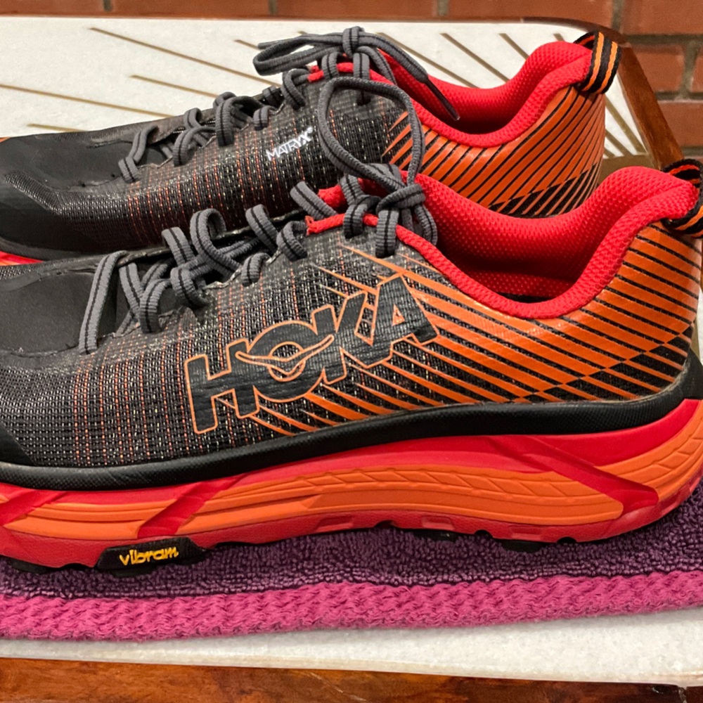 Hoka Black and Orange Athletic Shoes